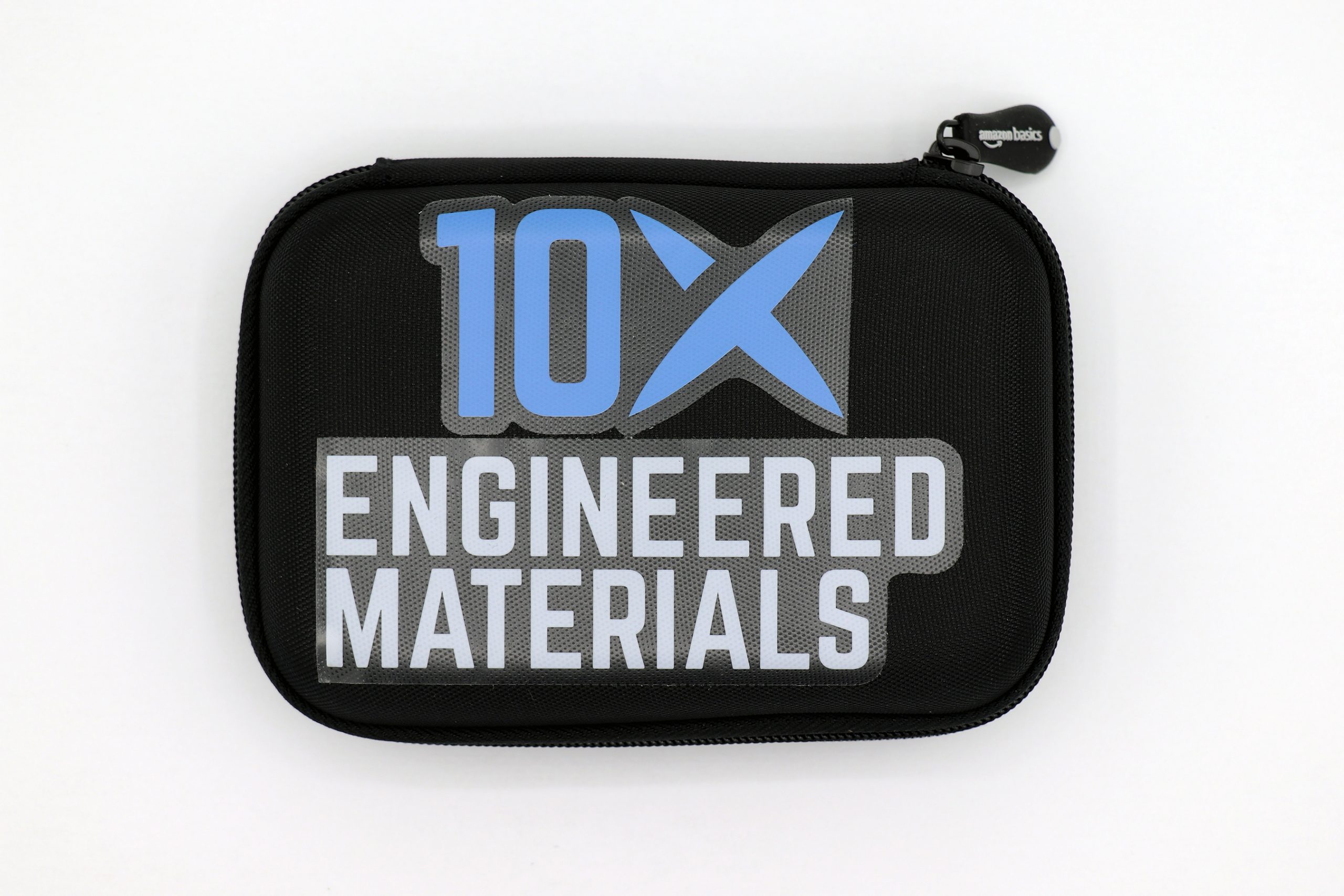 a black zipper case which reads "10X Engineered Materials"