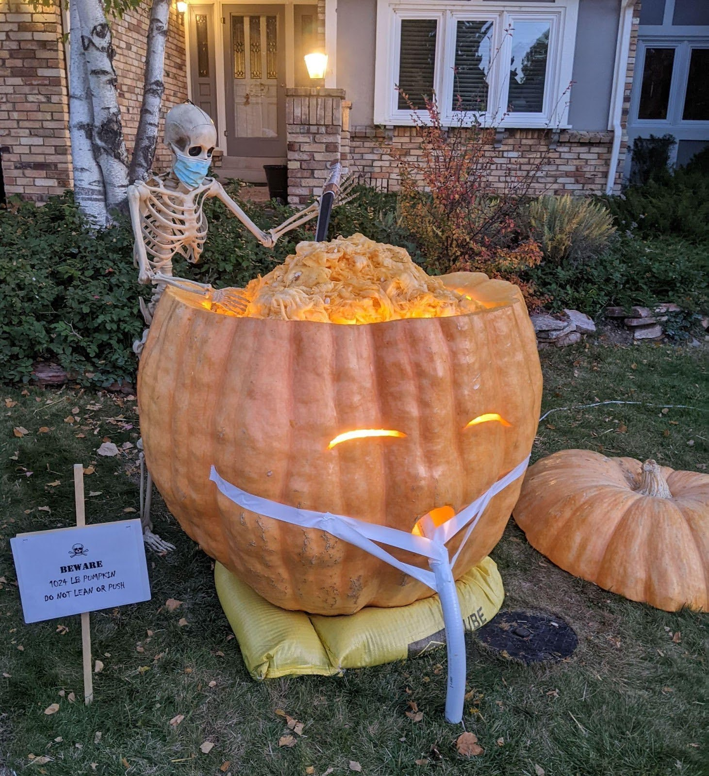 A giant pumpkin carved to look like an intubated patient