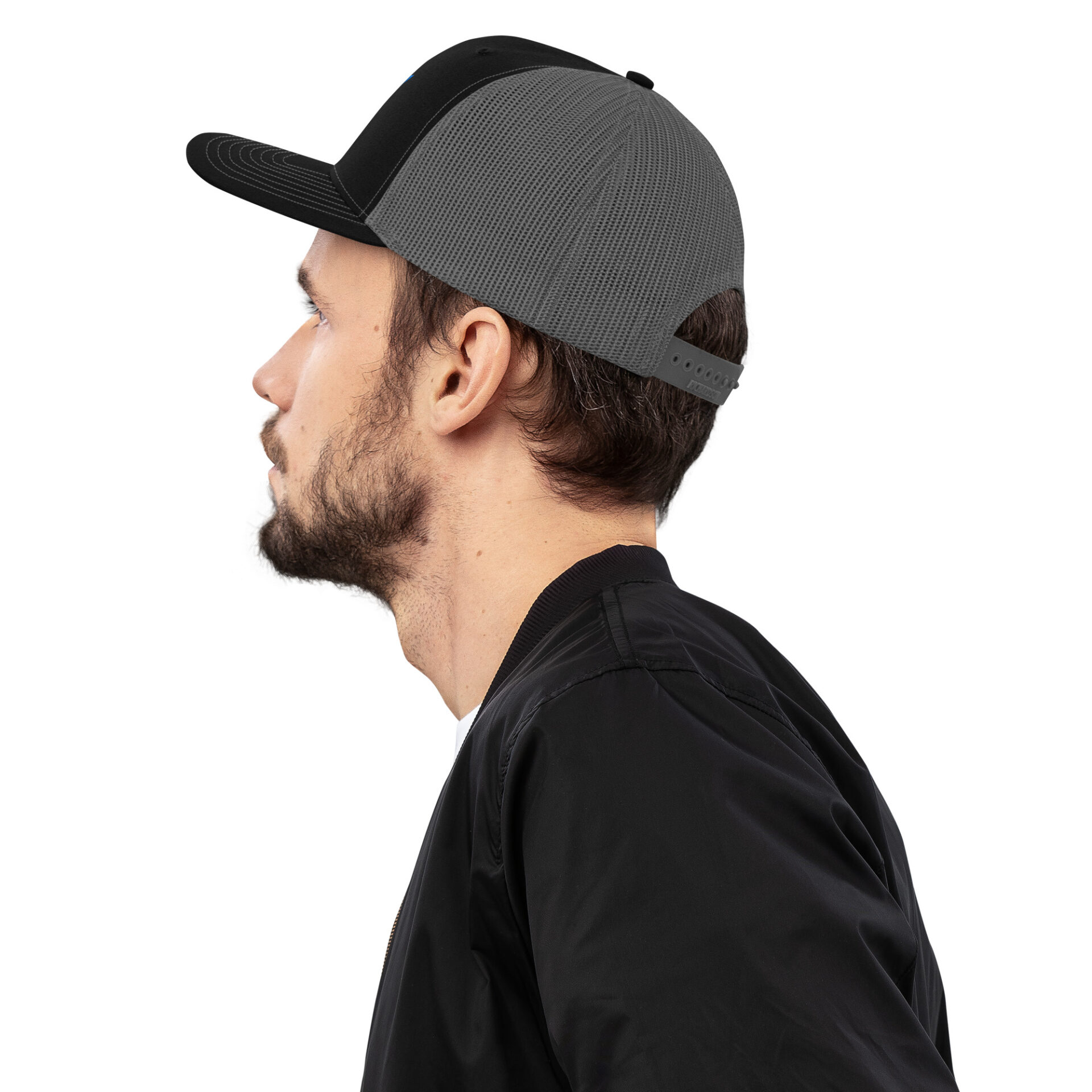 a man wearing a black and grey hat