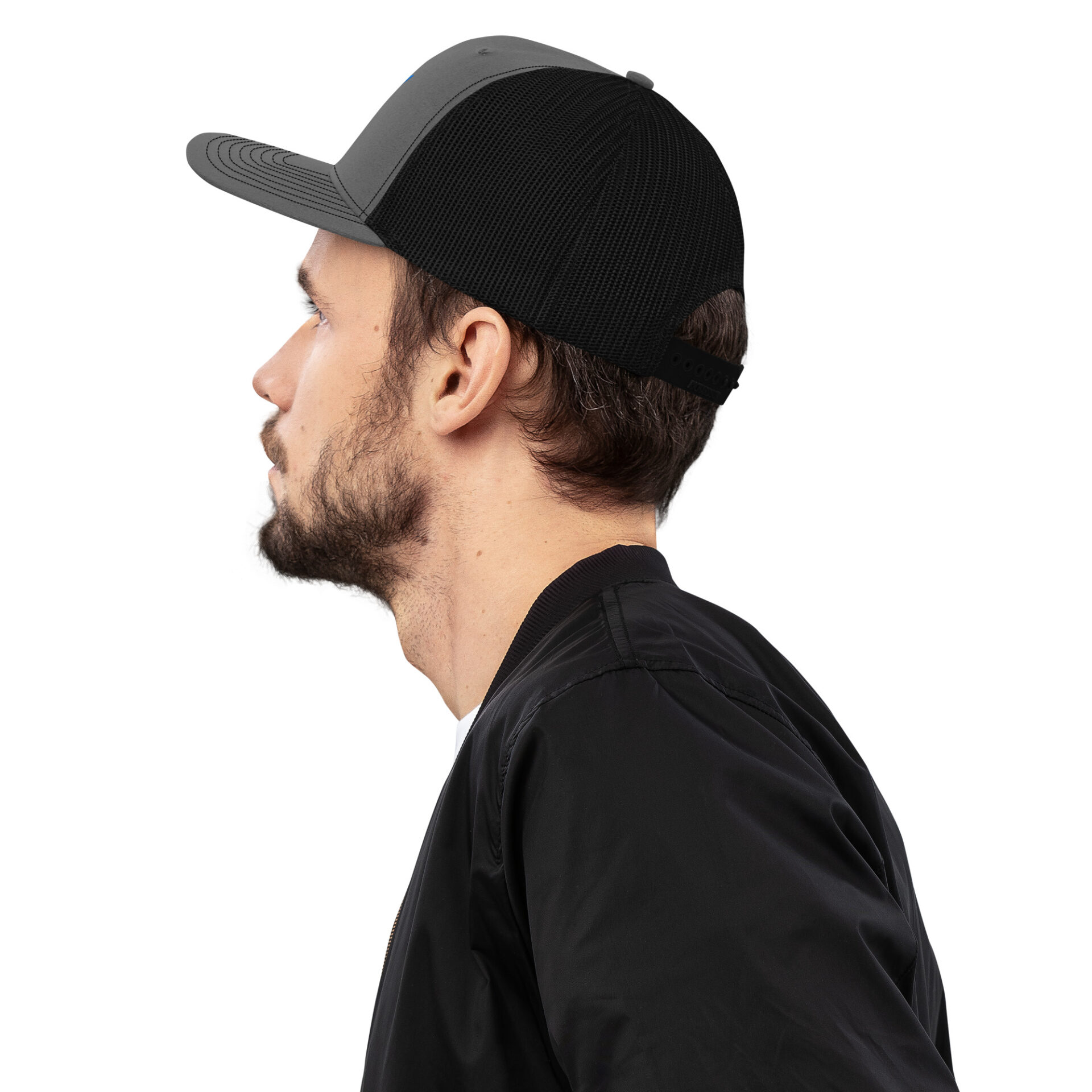 a man wearing a black and grey baseball cap