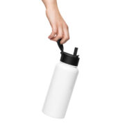 a hand is holding a white water bottle with a black straw