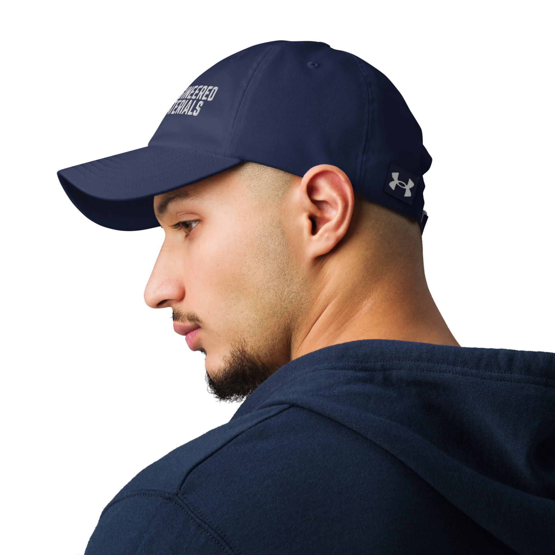 a man wearing a blue under armour baseball cap